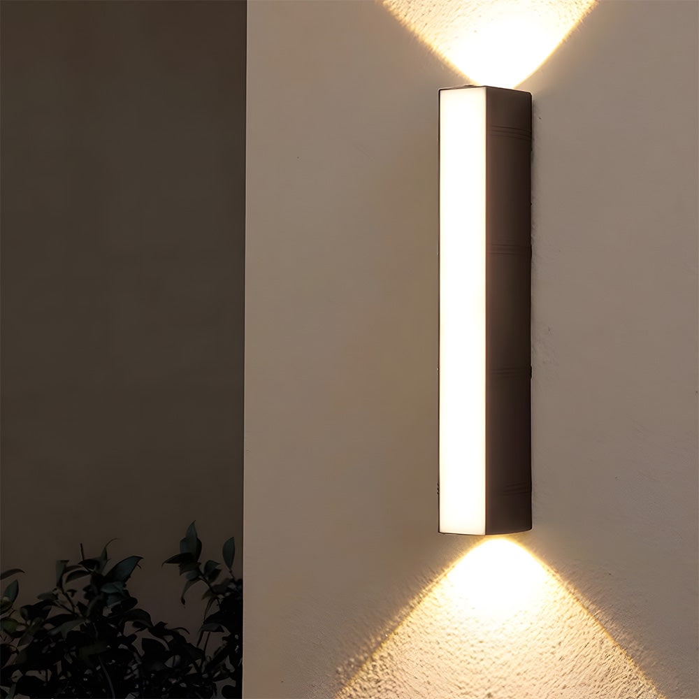 Outdoor Wall Sconce with Up and Down LED Lighting and Modern Architectural Design - Image 1